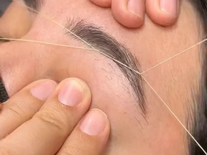 Threading- eyebrow neatening